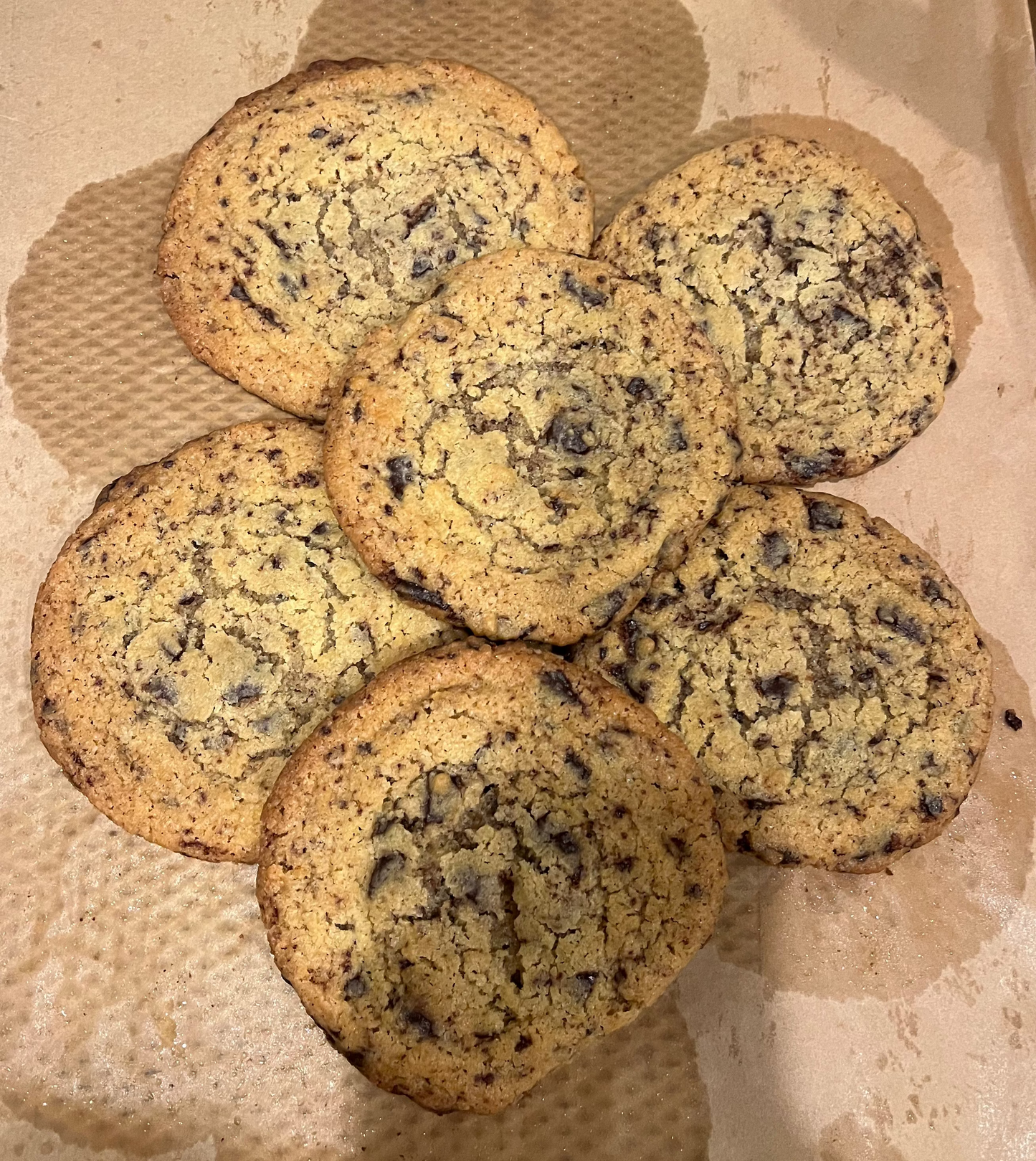 Cookies on a baking tray with parchment paper