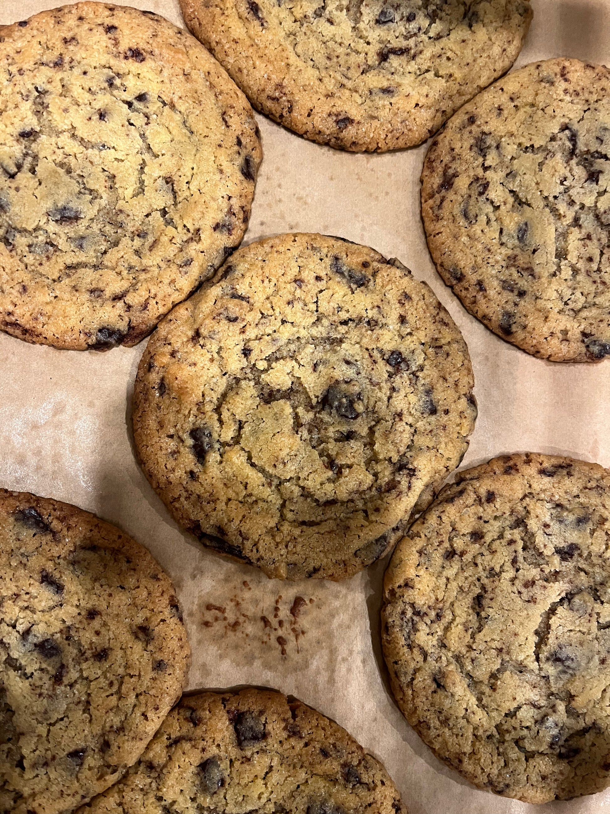 Cookies with chocolate chips on a light surface