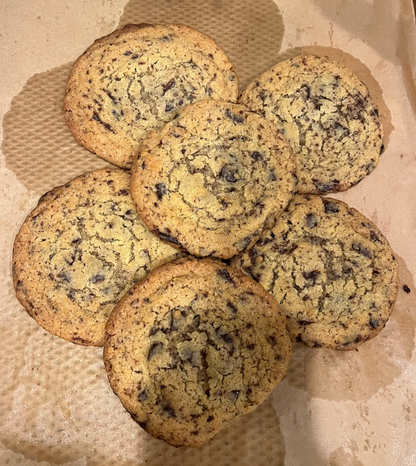 Cookies on a baking tray with parchment paper